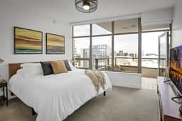 Upscale 2BR Condo with Bay Views, Pool, & Rooftop Deck